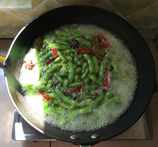 the steps of spiced edamame