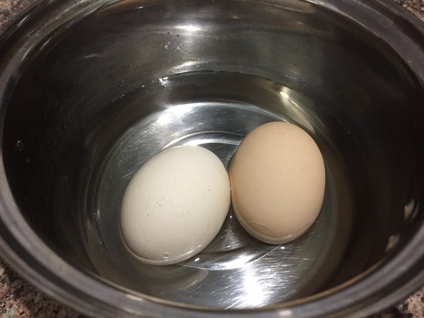 the steps of mixing eggs with garlic puree